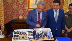 Orman İşletmesi'nden Kaymakam Turan'a fotoğraf albümü