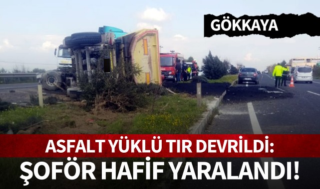 Gökkaya’da asfalt yüklü TIR devrildi: şoförü hafif yaralandı