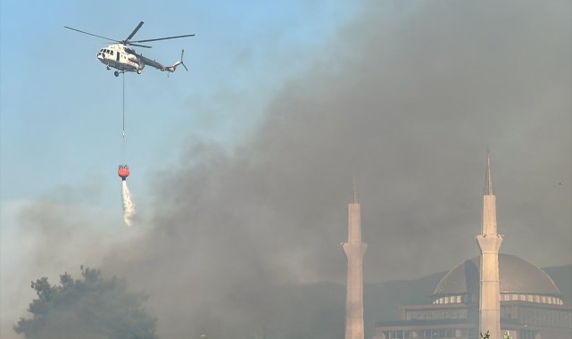 Kemalpaşada zirai alanda çıkan yangın kontrol altına alındı