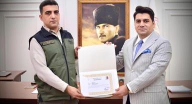 Kaymakamdan Ahmetli Orman İşletme Şefi Hasan Ali Yer’e Başarı Belgesi